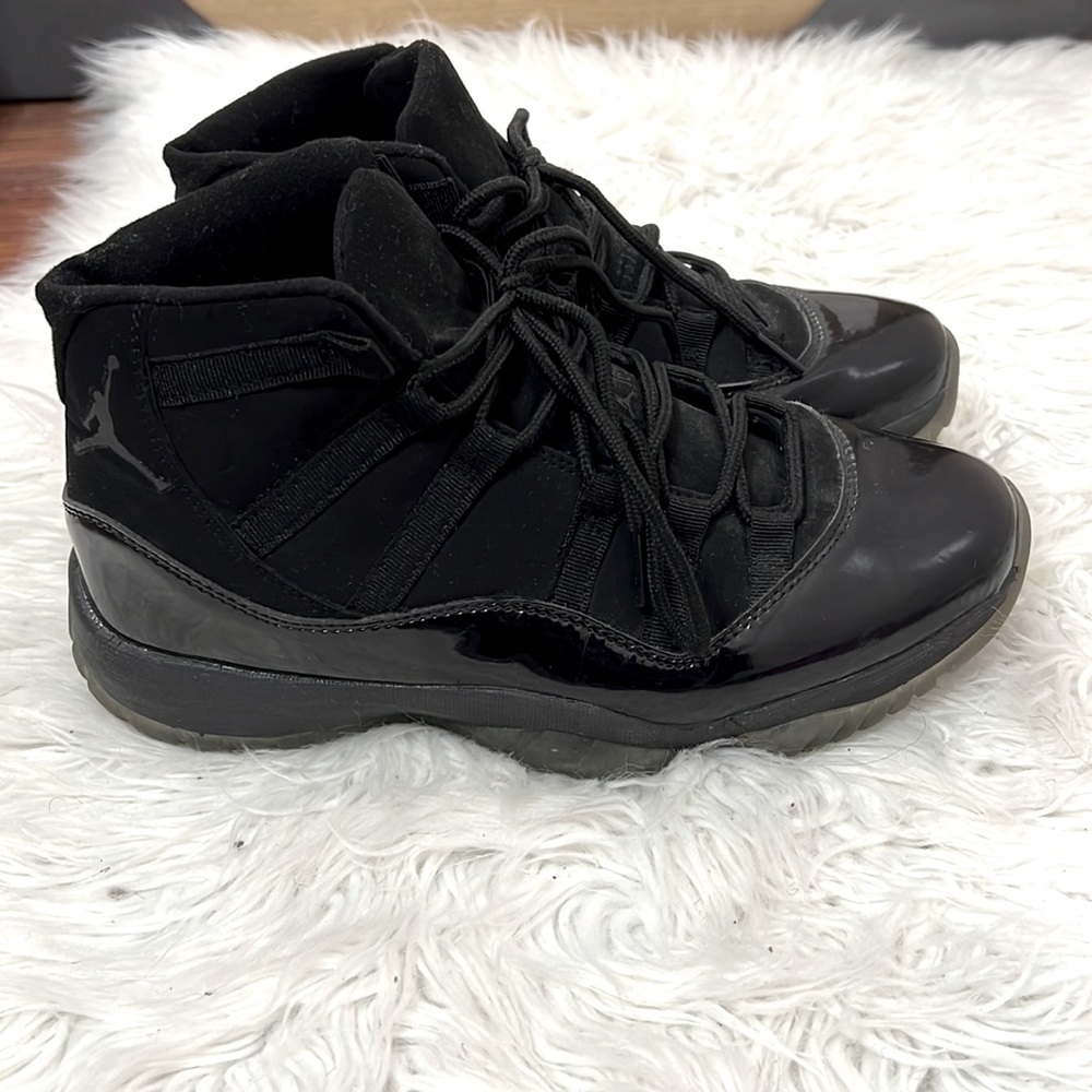 Air Jordan 11s Retro Cap and Gown Black